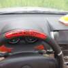 must roolikate punase draakoni disainiga auto roolil