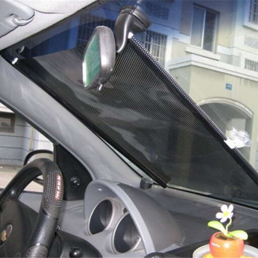 must volditav aknakate auto esiklaasil, kinnitatud peegli külge