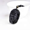 mustast kivist buddha peaga kaelakee valgel taustal
