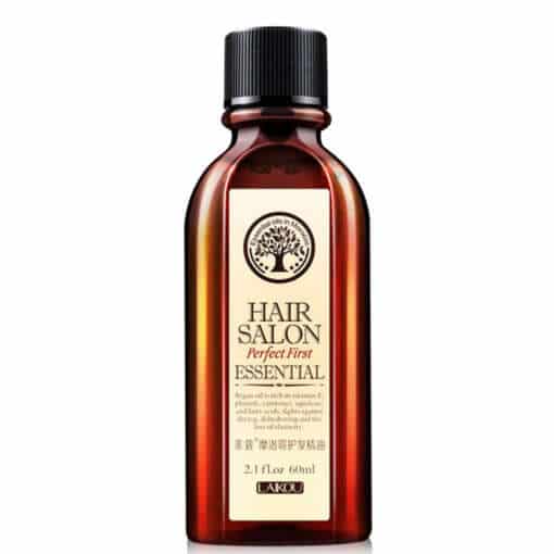 pruun klaaspudel musta korgiga, silt kirjaga 'hair salon essential'