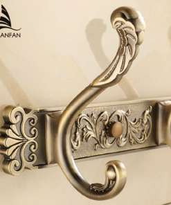 antiikse välimusega metallist rätikukonksud ornamentidega