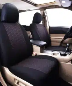 auto esiistmed mustade ja punaste täppidega istmekatetega