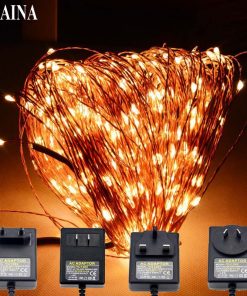 50 meetri pikkune valguskett 500 sooja valge LED pirniga, mis on kokku keritud ja mille kõrval on adapterid