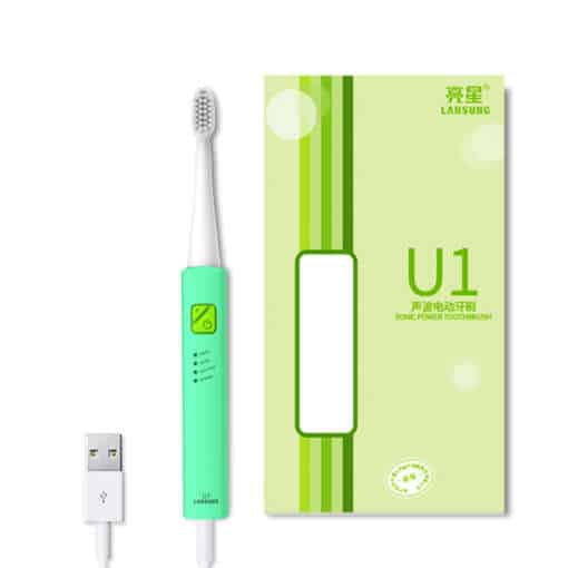 valge ja roheline elektriline hambahari koos USB kaabliga