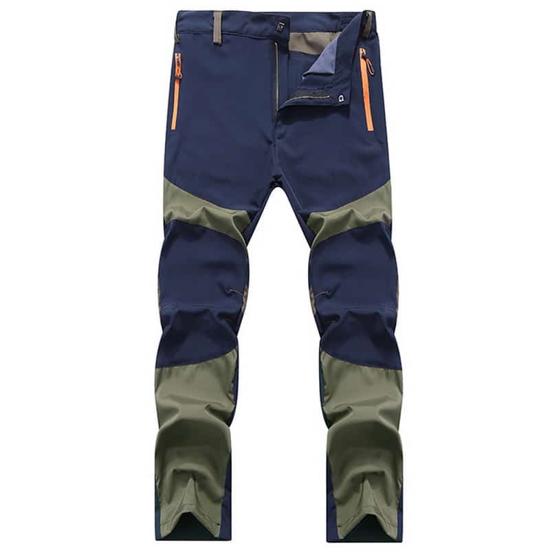 sinised ja rohelised meeste püksid oranžide lukkudega