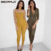 Liibuv jumpsuit sügava dekolteega