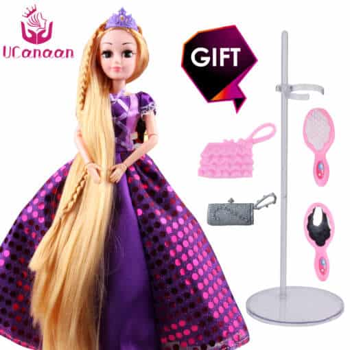 Lillas kleidis pikkade juustega barbie nukk, millel on liigutatavad liigesed ja paksud pikad blondid juuksed, sobib suurepäraselt lastele mängimiseks.