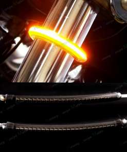 LED läätsed Harley Victory mootorrattale, näidatud paigaldatuna mootorratta esile, kiirgades ereda oranži valguse. Läätsed on paigaldatud kroomitud torule, pakkudes stiilset ja turvalist valgustust.
