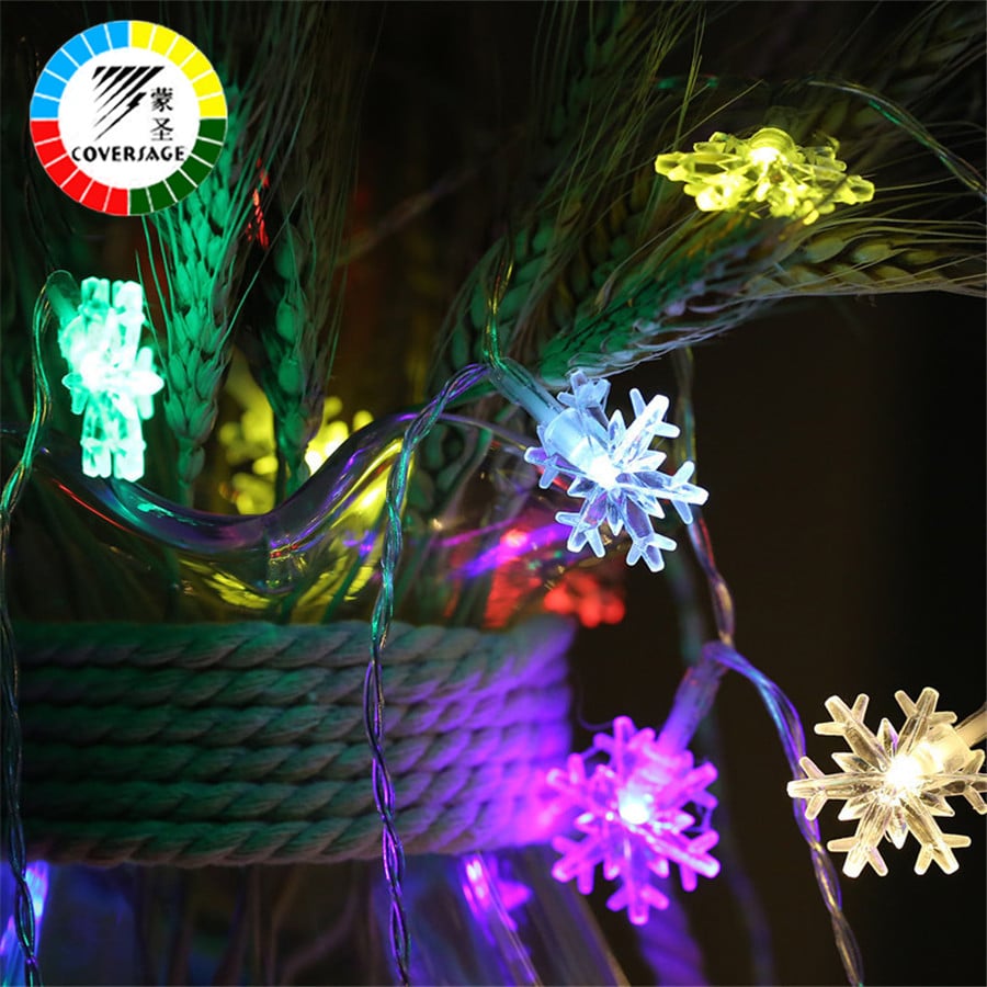 Lumehelvestega valguskett 10 m, 100 LED pirni, sobib jõulukaunistusteks ja välitingimustes kasutamiseks.