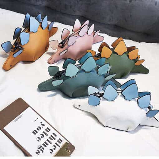 Lõbus dinosauruse käekott, millel on 3D efekt ja kameeleoni stiilis disain, ideaalne tüdrukutele crossbody kotina.