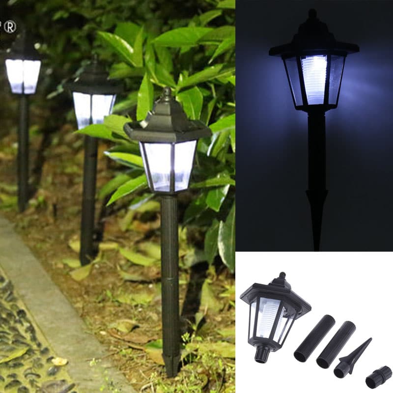 Veekindel kuusnurga kujuline päikesepatareiga LED aiavalgusti klassikalises stiilis, ideaalne välistingimustes kasutamiseks.