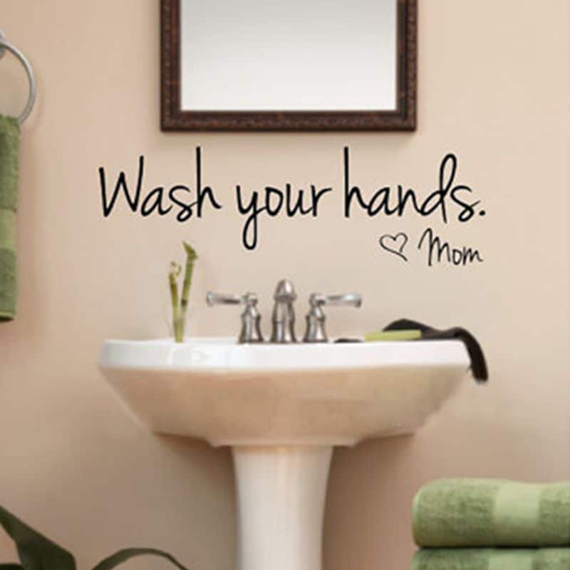 Veekindel vinüülseinakleeps "Wash Your Hands" vannitoa seinale.