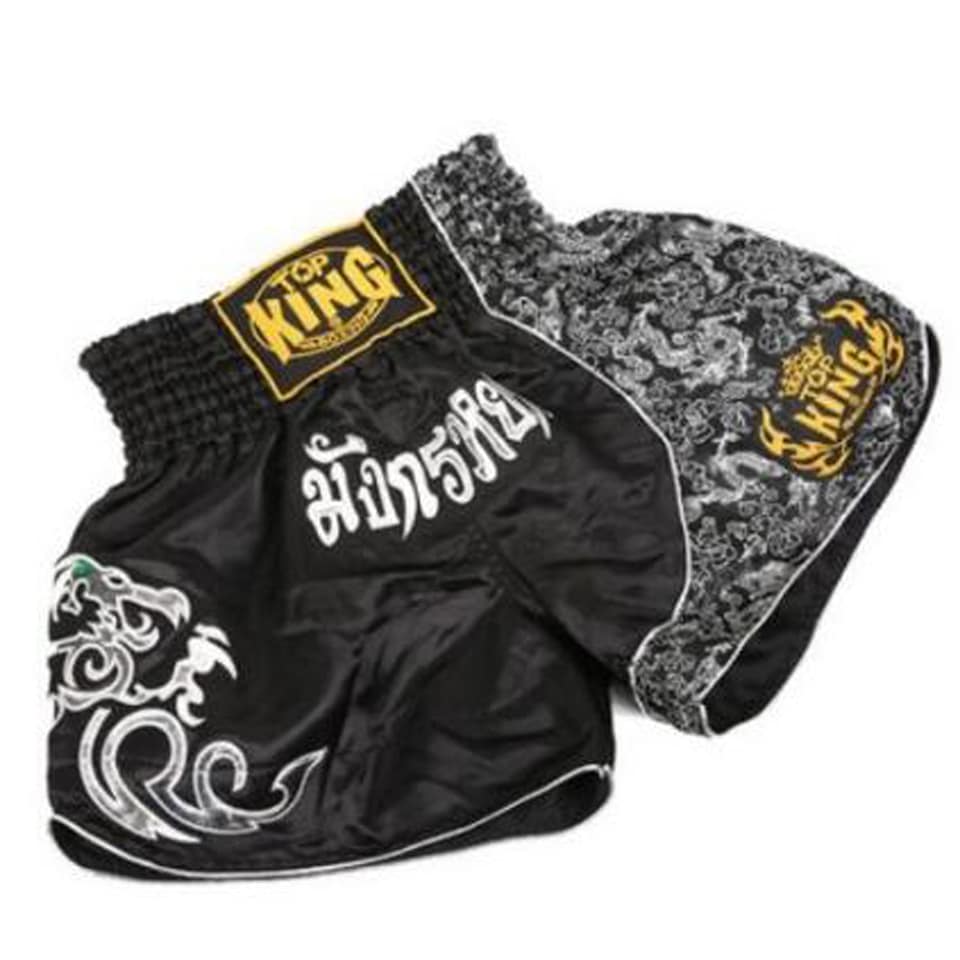Mustad lühikesed püksid poksimiseks, sportlik disain, sobivad kickboxing ja Muay Thai treeninguteks.