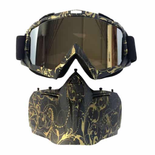 mustad suusaprillid ja mask kuldse mustriga