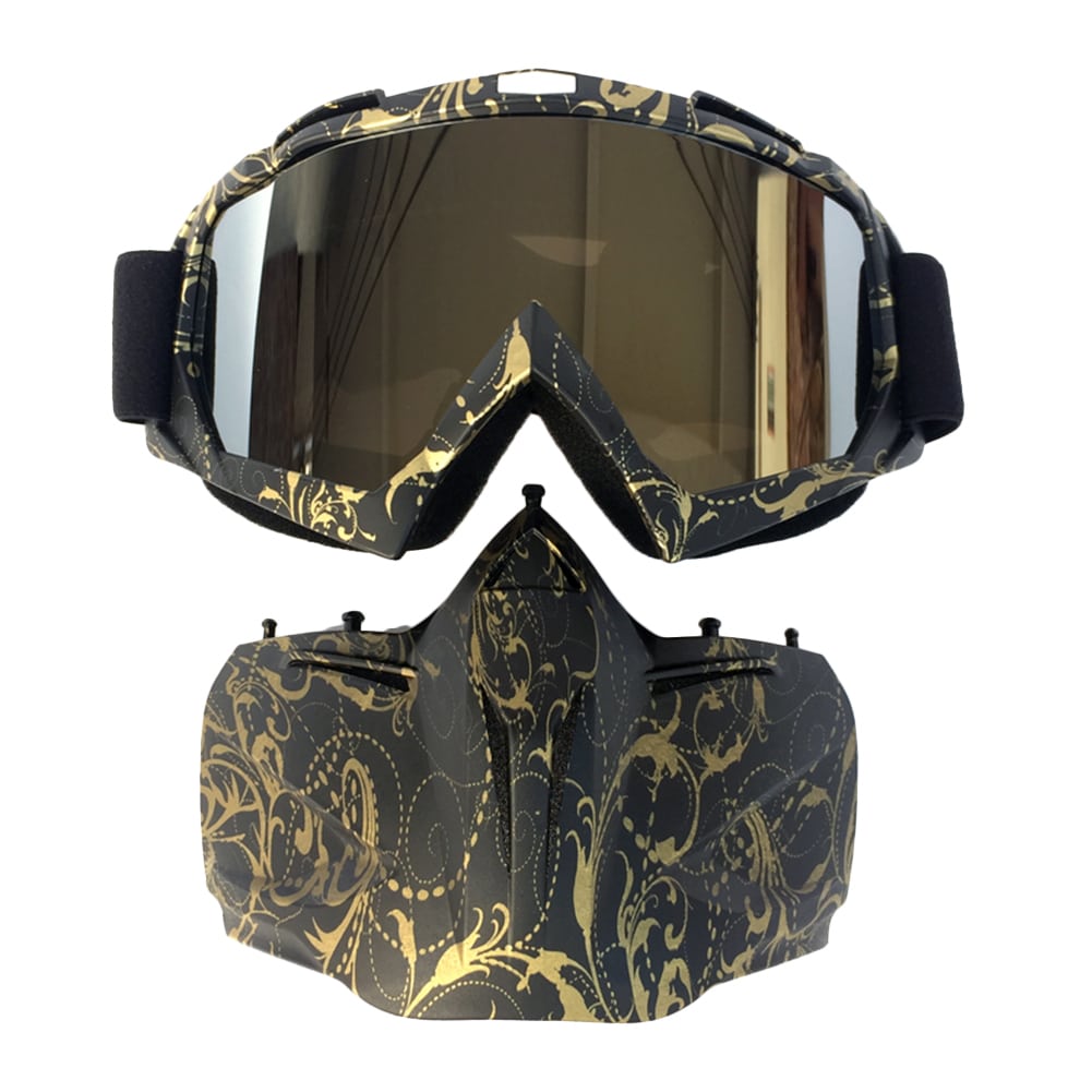 mustad suusaprillid ja mask kuldse mustriga