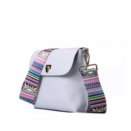 Mustrilise rihmaga naiste õlakott DAUNAVIA, valmistatud PU nahast, sobib kandmiseks üle õla või crossbody stiilis.