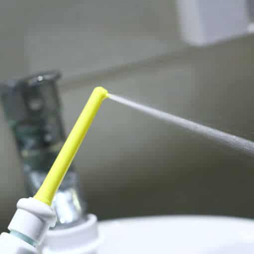 kraani külge kinnitatav kollane pihusti, mis suunab veejoa