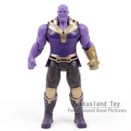 Marveli Thanose figuriin, kus Thanos poseerib oma ikoonilise kindaga.