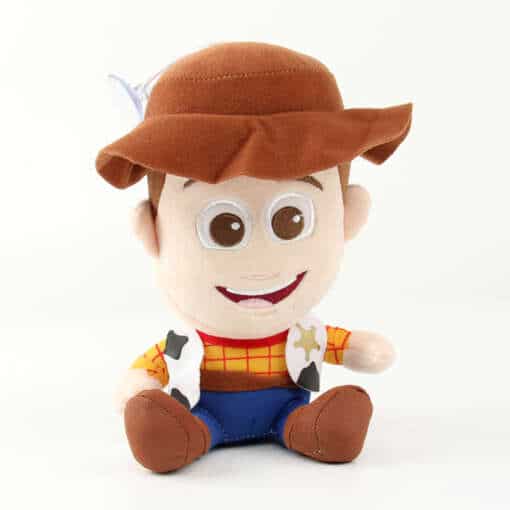 pehmest materjalist woody ja buzz lightyear mänguasjad istumas kõrvuti