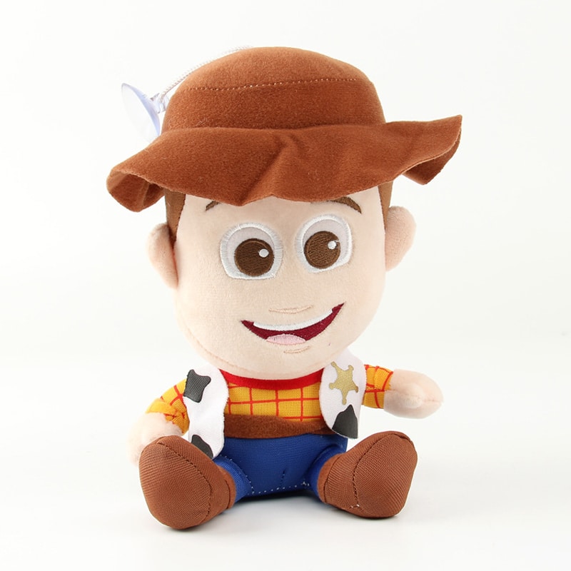 pehmest materjalist woody ja buzz lightyear mänguasjad istumas kõrvuti