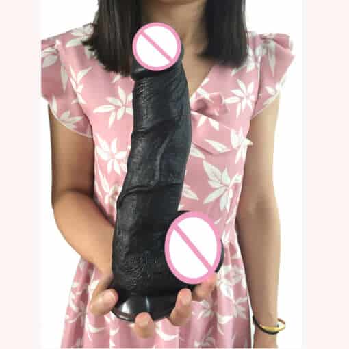 Suur paindlik dildo musta värvi ja realistliku tekstuuriga, paindub erinevates suundades.