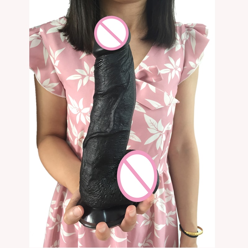 Suur paindlik dildo musta värvi ja realistliku tekstuuriga, paindub erinevates suundades.