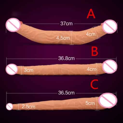 Kahe otsaga pikk dildo horisontaalselt asetatud helelilla taustal