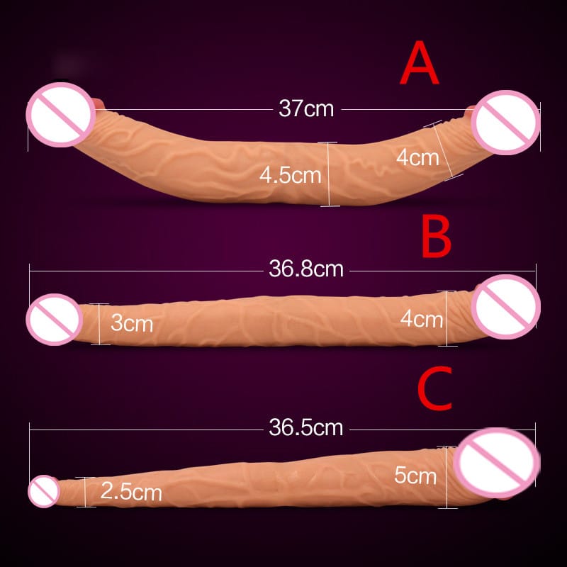 Kahe otsaga pikk dildo horisontaalselt asetatud helelilla taustal