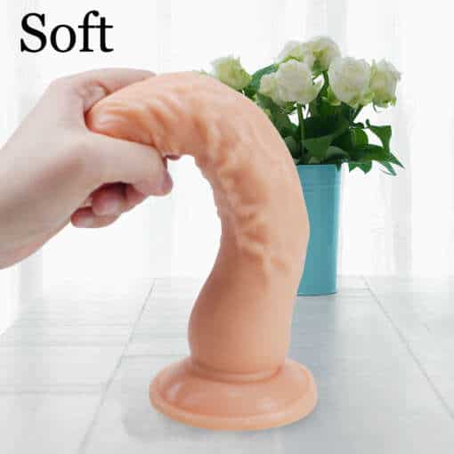 Veekindel ja paindlik realistlik dildo valgel taustal