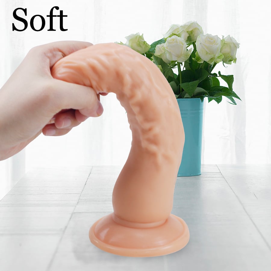 Veekindel ja paindlik realistlik dildo valgel taustal