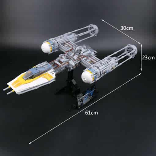 tähesõdade y-wing fighter lego komplekt halli ja kollase värviga, detailne kosmoselaeva mudel koos minifiguuridega