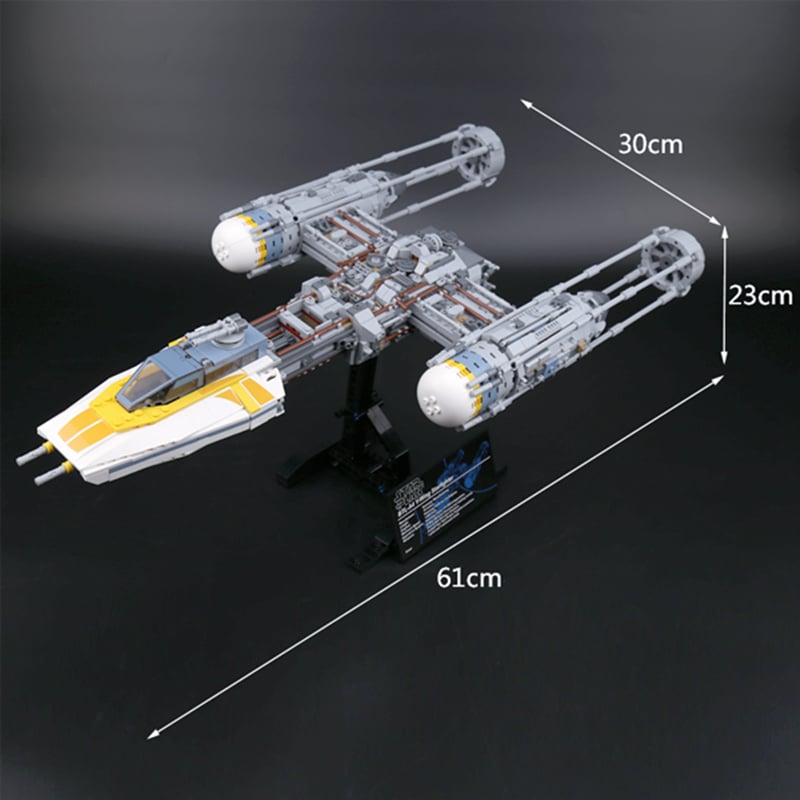tähesõdade y-wing fighter lego komplekt halli ja kollase värviga, detailne kosmoselaeva mudel koos minifiguuridega