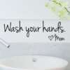 seinakleeps tekstiga wash your hands valgel taustal