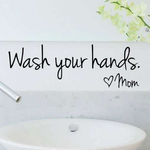 seinakleeps tekstiga wash your hands valgel taustal