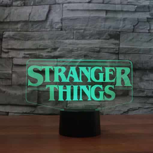 LED lamp stranger things teemalise kujundusega musta alusega ja värviliste tuledega
