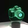 LED lamp fotokaamera kujundusega musta ja valgega