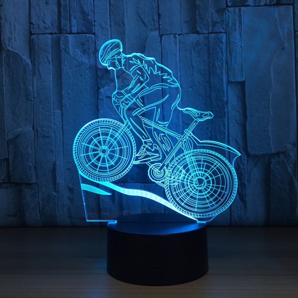 3D lamp rattur kujutab jalgratturit sõitmas lambivalguses