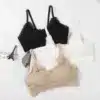 seksikas lühike naiste topp modellil, mõõdud rind 66-88 cm, pikkus 30 cm, esivaade, must taust