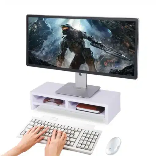 väike riiul monitorile laual koos klaviatuuri ja kontoritarvetega