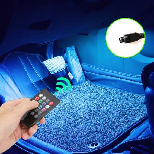 auto jalgade ala sinise LED valgustusega ja kaugjuhtimispult käes