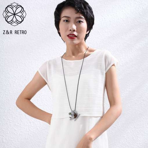Linnukujulise ripatsiga vintage stiilis kee