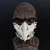 tumedatooniline mask draakoniluude motiiviga