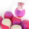 värvilised pehmed pallid, mille sees on täidis