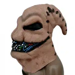 pruun lateksist mask, millel on mustad silmad ja suu, kaunistatud värviliste detailidega