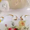 dekoratiivne vaas lillede ja ornamentidega