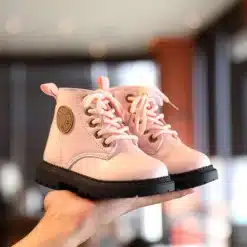 Pink leather children's boots with laces, non-slip black soles, and a side patch design, perfect laste saapad for autumn/winter.