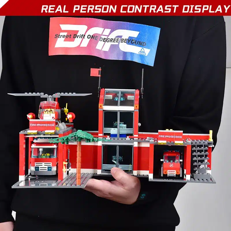 punane Lego tuletõrjedepoo komplekt koos helikopteri ja autodega
