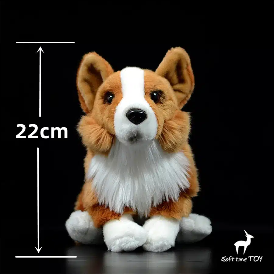 pruun ja valge pehme mänguloom, mis kujutab welsh corgi koera, istuvas asendis